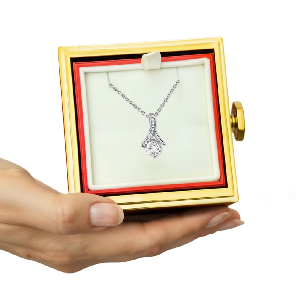 Alluring Beauty Necklace and Rotating Rose Gift Box.
